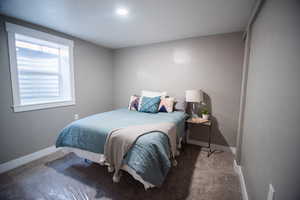 View of carpeted bedroom