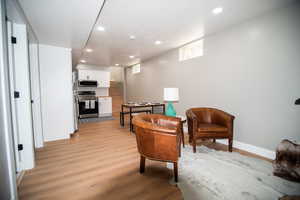 Living area featuring light hardwood / wood-style flooring