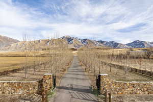 Property view of mountains with a rural view