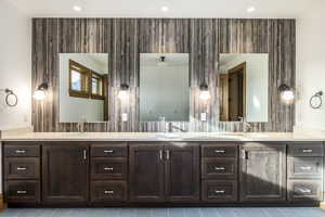 Bathroom featuring vanity and tile patterned floors