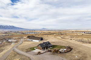 Drone / aerial view featuring a mountain view and a rural view