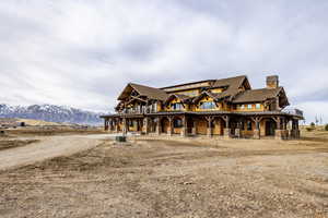 View of front of property featuring a mountain view