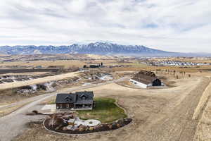 Drone / aerial view featuring a mountain view and a rural view