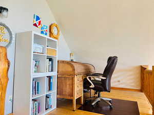 Office space with wood-type flooring