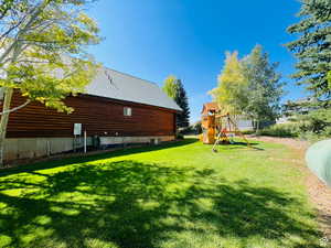 View of yard with a playground