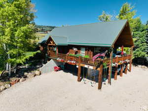 View of front of home with a deck