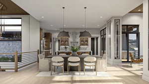 Dining area with light hardwood / wood-style flooring