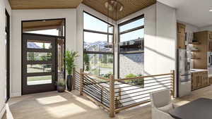 Entryway with a mountain view, light hardwood / wood-style floors, vaulted ceiling, and wooden ceiling