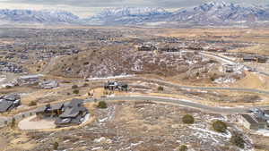 Birds eye view of property with a mountain view