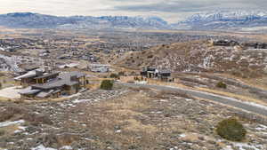 Snowy aerial view with a mountain view