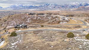 Birds eye view of property with a mountain view