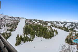 Snowy aerial view with a mountain view