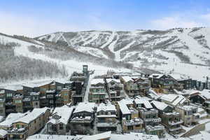 Snowy aerial view with a mountain view