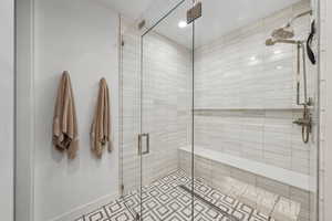 Bathroom featuring a shower with shower door