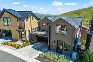 View of front of home featuring a mountain view