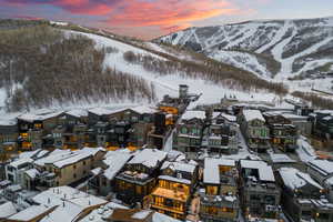 Snowy aerial view with a mountain view