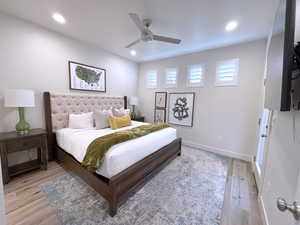 Bedroom featuring light wood-type flooring and ceiling fan