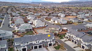 Birds eye view of property featuring a mountain view