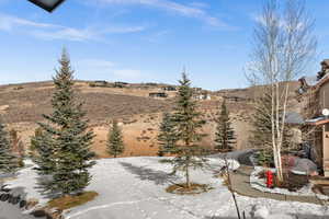 View of yard covered in snow