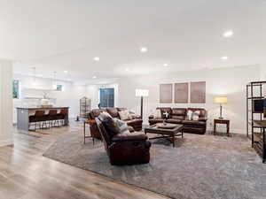 Living room with light wood-type flooring