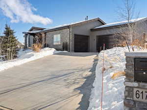 View of front of property featuring a garage