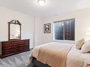 View of carpeted bedroom