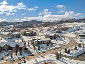 Snowy aerial view with a mountain view