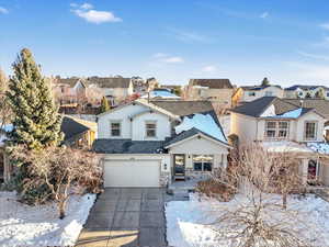 View of front of home featuring a garage