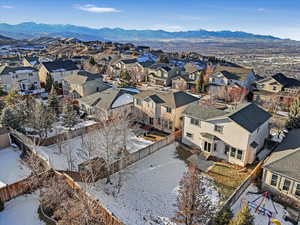 Snowy aerial view with a mountain view