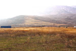 Property view of mountains featuring a rural view