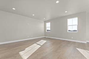 Spare room with light wood-type flooring