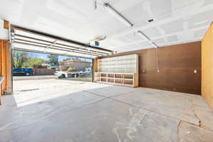 Garage featuring a garage door opener