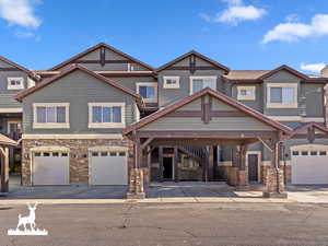 View of front of property with a garage