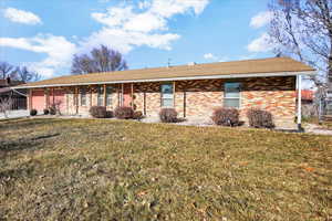 View of front of home featuring a front yard