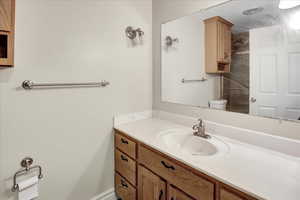 Bathroom with vanity and toilet