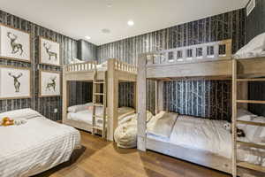 Bedroom featuring wood-type flooring