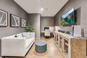 Living room with hardwood / wood-style floors