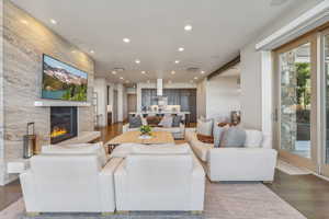 Living room featuring hardwood / wood-style floors and a fireplace