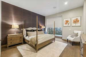 Bedroom featuring dark hardwood / wood-style flooring