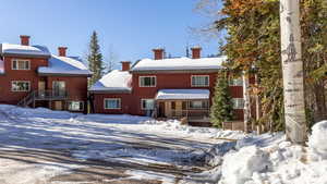 View of snow covered property