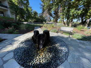 View of property's community with a patio area