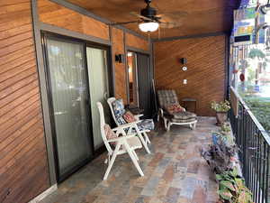 View featuring ceiling fan and a balcony