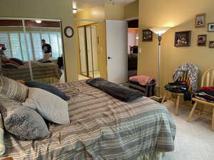 Bedroom featuring carpet