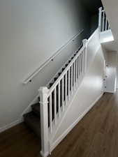 Staircase with wood-type flooring