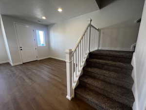 Entryway with wood-type flooring