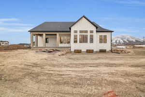 Rear view of house with a mountain view