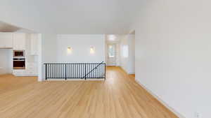 Empty room with light wood-type flooring