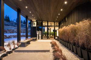 View of snow covered property entrance