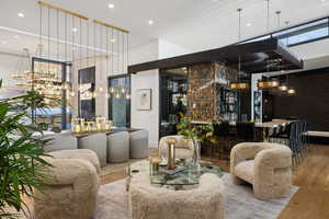 Interior space featuring hardwood / wood-style floors and a towering ceiling