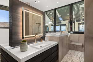 Bathroom with vanity and walk in shower